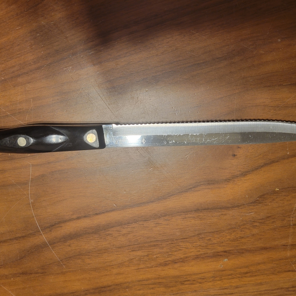 Cutco Serrated Kitchen Knife with Black Handle